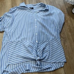 Light weight blue and white stripped blouse that ties in the front
